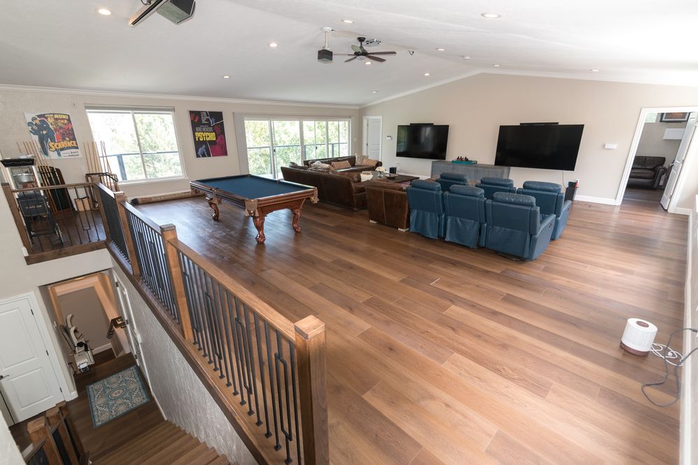 Upstairs game room with pool table and TV lounge